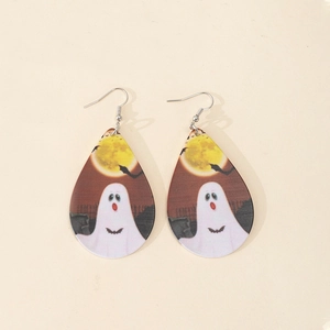 Detailed view of teardrop acrylic earrings with ghost and moon Halloween prints
