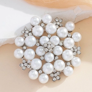 Elegant floral pearl brooch with sparkling rhinestones in a circular cluster design