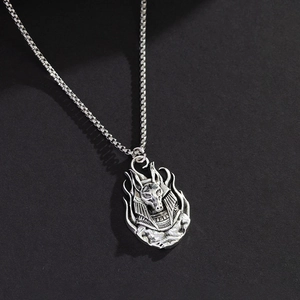 Vintage Anubis pendant necklace in antique silver with flame relief on box chain