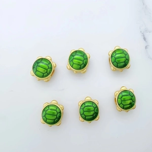 Golden turtle beads with green enamel for DIY necklaces and bracelets making