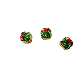 Three-piece gold-plated koi carp beads with vibrant green and red enamel fish pattern