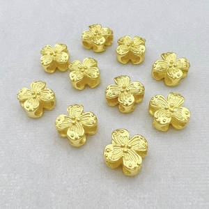 Set of 10 gold hollow clover spacer beads with matte finish for jewelry making