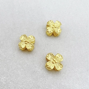 Three gold-plated clover beads with sandblast texture for DIY jewelry making