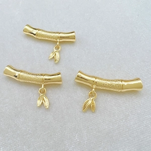 Three gold bamboo joint pendants with leaves for DIY jewelry making and necklaces