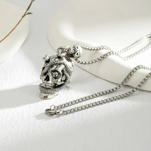 Gothic punk skull pendant necklace with snake wrap design and stainless steel box chain