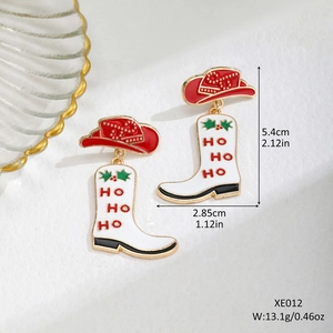 Detailed view of Christmas boot earrings with Ho Ho Ho text and size specifications