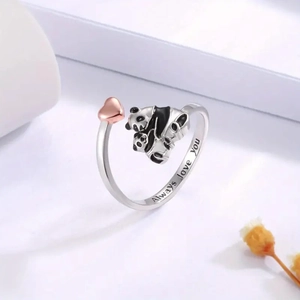 Macro shot of silver panda ring with heart detail and Always love you engraving