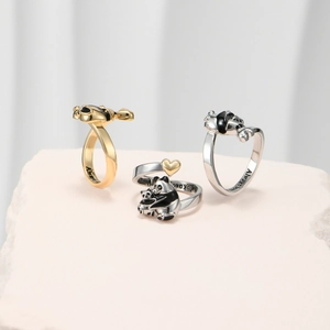 Detail of panda rings with black and white enamel and engraved Always love YOU message