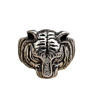 Vintage silver tiger head open ring with punk style and detailed metallic engraving