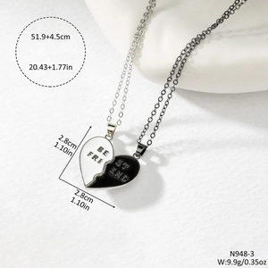 Magnetic heart pendant necklaces for best friends with black and white enamel drip