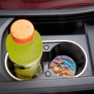Close-up of car cup holder coaster with realistic ocean beach 3D resin design