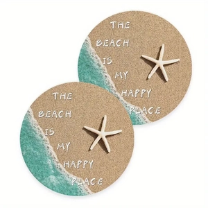 Detail view of round beach themed car coasters with sea star and text The Beach Is My Happy Place