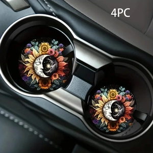 Detail of 4-piece set of artistic sunflower car coasters inside a black vehicle cup holder