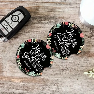 Set of 2 floral car coasters with inspirational quote on wood texture background