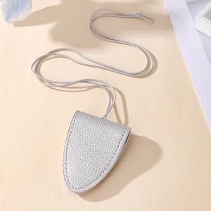 Detailed close-up of grey litchi grain leather glasses holder necklace with fine stitching