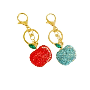 Sparkling apple fruit keychains with colorful rhinestones in red and light blue colors
