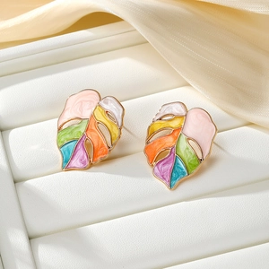 Colorful monstera leaf stud earrings with gold plating and marble enamel textures