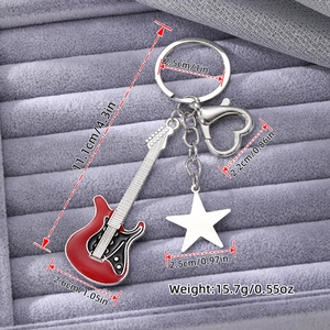 Y2K vintage red guitar keychain with silver star charm and heart-shaped carabiner hook