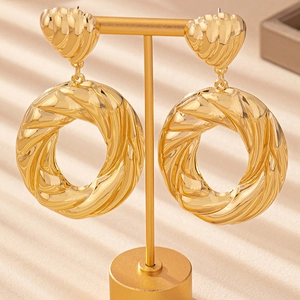 Fashionable gold-plated thick twisted hoop earrings with shell texture stud design