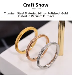 Close-up of matte titanium steel rings in gold, rose gold and silver with mirror edges