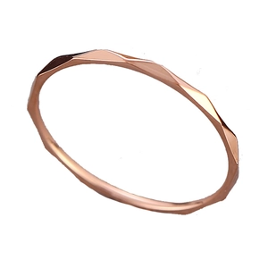 Minimalist V-shaped rose gold stainless steel ring with elegant geometric faceted design