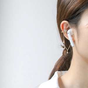 Manchette d'oreille étoile dorée avec chaîne pour écouteurs sans fil anti-perte