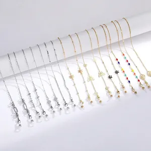 Catene per occhiali multifunzionali oro e argento con ciondoli a stella e farfalla