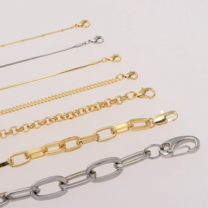 Collane a strati con maglie cubane spesse in oro e argento e chiusura a moschettone