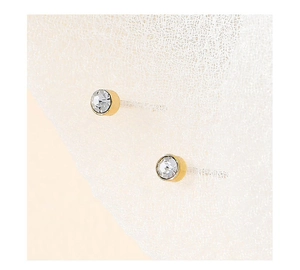 Detail shot of elegant geometric S925 silver needle stud earrings with round zircon stones