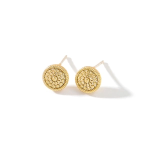 Detailed macro view of S925 silver needle gold earrings with vintage milgrain texture