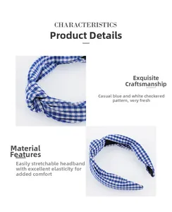 Detail view of blue and white gingham knot headband showing flexible fabric and elastic core