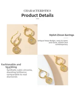 Detailed close-up of golden round earrings with sunburst charms and sparkling cubic zirconia