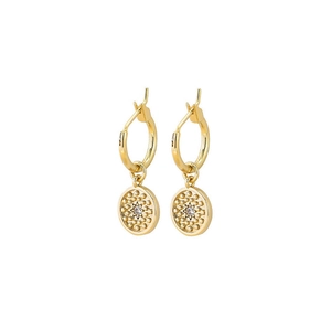 Detailed view of gold hoop earrings featuring sunburst coin pendants with zircons