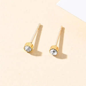 Classic gold plated round stud earrings with clear sparkling zircon for a minimalist look