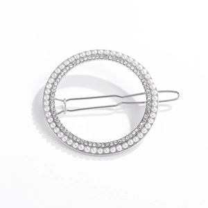 Elegant geometric hair clip with white pearls and sparkling rhinestones on silver metal base