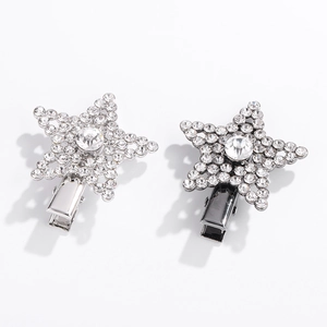 Star shaped rhinestone hair clips in silver and gunmetal finish for women