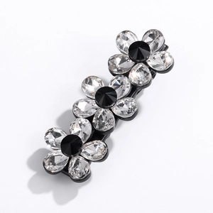 Fashionable metal hair clip with three crystal flower designs and black pearl center detail