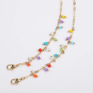 Multicolor beaded gold chain for glasses and masks featuring vibrant charms and lobster clasps