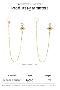 Détail de boucles d'oreilles œil protecteur dorées de 11,7cm avec zircon et chaîne