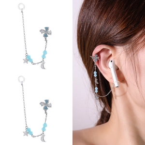 Silver anti-loss earring strap with blue beads for wireless earbuds on a female model