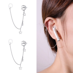 Detail view of silver moon and star anti-loss earring chain for wireless earbuds