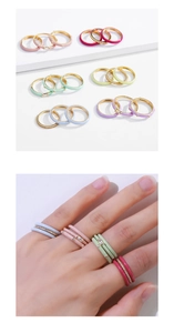 Detailansicht bunter Emaille Ringe mit Zirkonia-Steinen auf vergoldetem Kupfer-Set