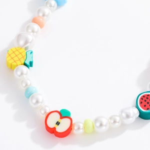 Handmade pearl beaded phone strap with colorful clay fruit charms and summer vibes
