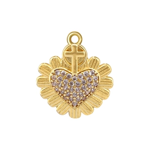 Close-up of a gold heart pendant with pavé pink stones and a small cross charm