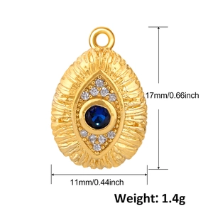 Detail view of 17mm gold evil eye pendant with blue gemstone and dimensions marking
