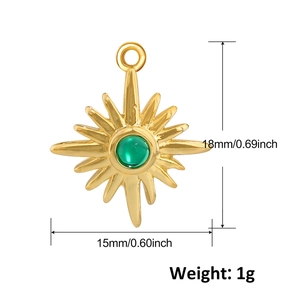 Detail of gold-plated sunburst star pendant with green gemstone and size dimensions