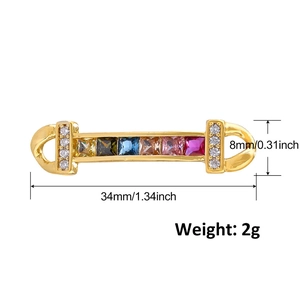 Detailed view of rectangular charm with 6 colored gemstones and dimensions 34x8mm