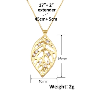 Detailed view of gold plated leaf pendant with small zircons and size measurements