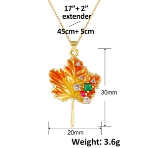 Detail of maple leaf pendant with colorful enamel and gems, 17+2 inch chain length info