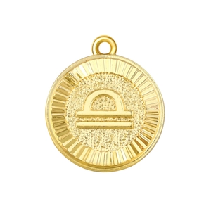Golden Libra zodiac coin pendant with embossed celestial symbol and sunburst texture